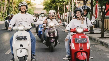 Naik Vespa
