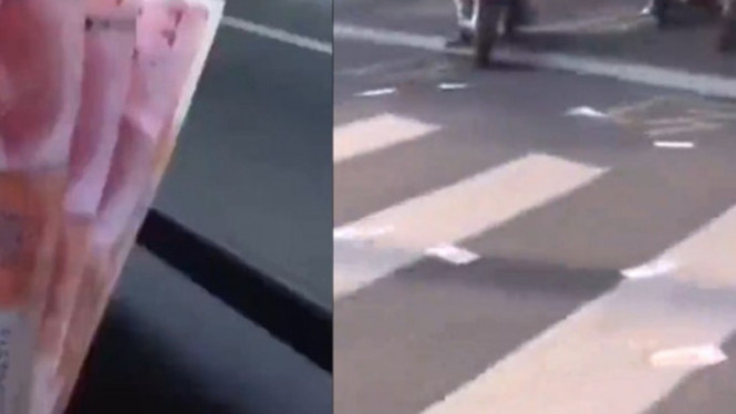 Viral uang berceceran di lampu merah.