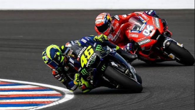 Valentino Rossi dan Andrea Dovisiozo