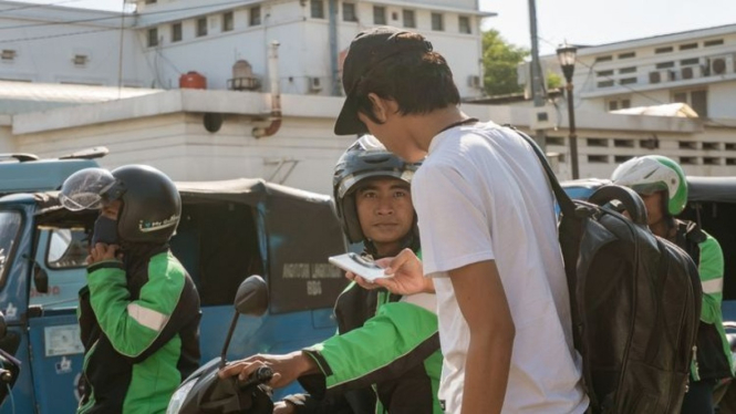 Driver Ojek Online dan Penumpang