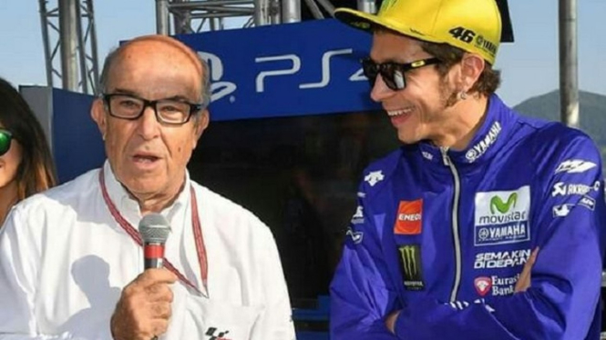 Carmelo Ezpeleta dan Valentino Rossi