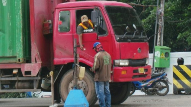 Pungli Sopir Truk
