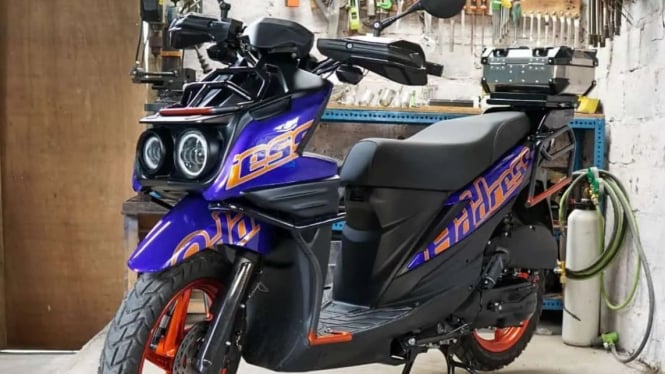 Suzuki Address bergaya adventure oleh Sky Custom Bogor.