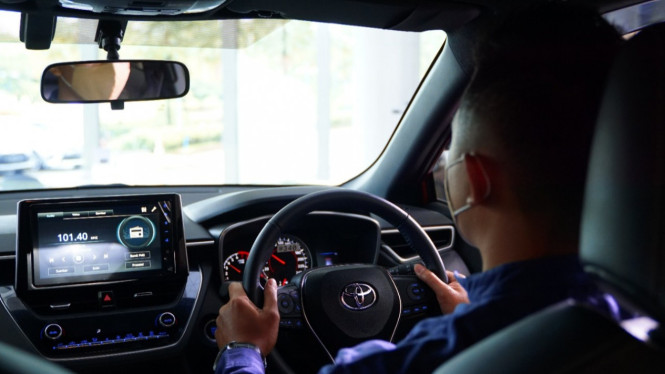 Ilustrasi mengendarai mobil Toyota