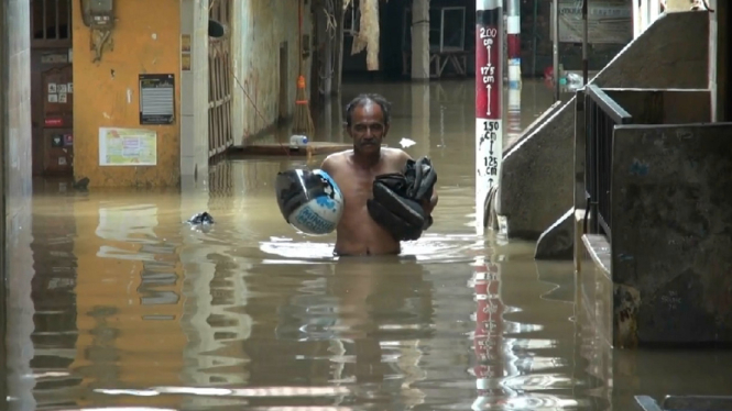 banjir melanda pemukiman warga