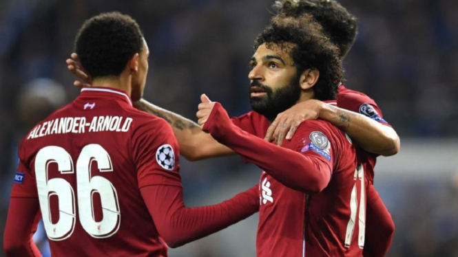 Trio Liverpool Roberto Firmino, Sadio Mane, dan Mohamed Salah sudah lima kali mencetak gol dalam satu pertandingan Liga Champions