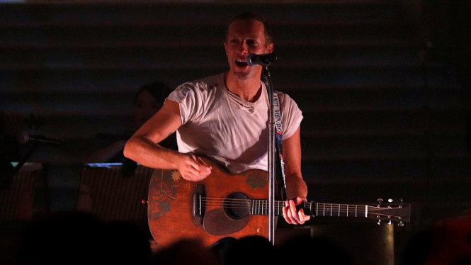 Coldplay performs at the Natural History Museum in London