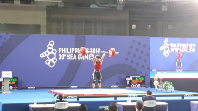 Emas terakhir dari cabor angkat besi di SEA Games 2019 dipersembahkan Abdullah Rahmat yang turun di kelas 73 kilogram putra