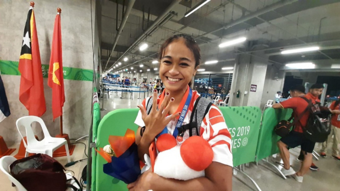 A.A Istri Kania Ratih meraih medali perunggu dari cabor renang nomor 50 meter gaya punggung,