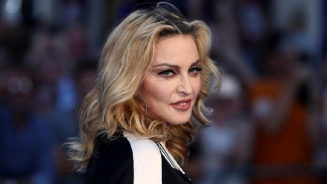 Klaim Punya Antibodi Virus Corona, Madonna Ingin Jalan-jalan (Foto: Reuters)