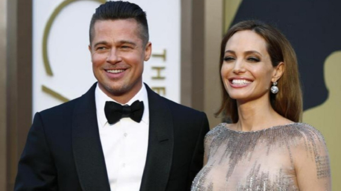 Brad Pitt dan Angelina Jolie saat menghadiri acara Academy Awards pada 2014 (Foto: Reuters)