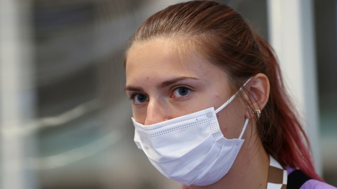 Belarusian athlete Krystsina Tsimanouskaya is seen at Haneda international airport in Tokyo, Japan