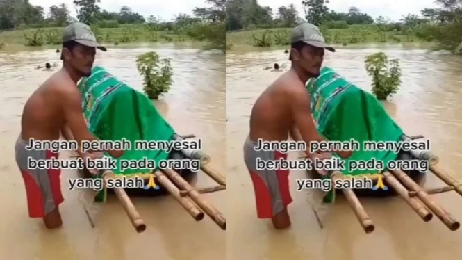 Viral video antar jenazah saat banjir.