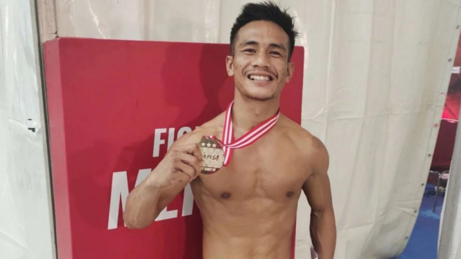 Faizal Lase jadi Juara Baru One Pride MMA Kelas Atom