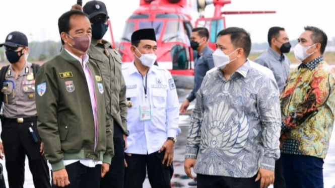 Presiden Joko Widodo dan Haji Andi Syamsuddin Andi Arsyad.