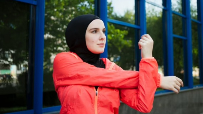 Ilustrasi wanita muslimah berolahraga