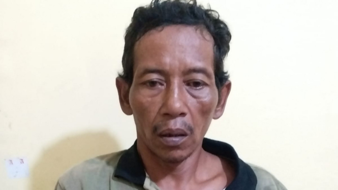 Arpandi (44), penjaga kebun sawit di Sarolangun Jambi, pelaku pemerkosaan dan pembunuhan siswi SMP.