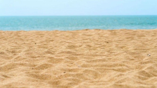 Ilustrasi pasir pantai.