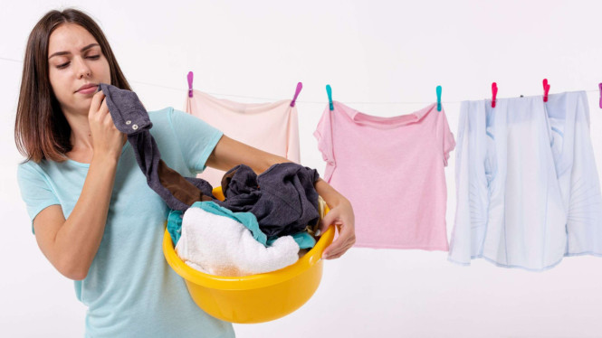 Ilustrasi menjemur pakaian