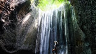 Keindahan Tersembunyi Air Terjun Tukad Cepung di Bali