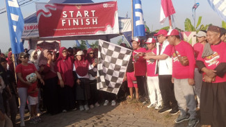 Semarak HUT RI ke-80, Masyarakat Perumda  Lobar Tumpah Ruah Ikuti Jalan Sehat