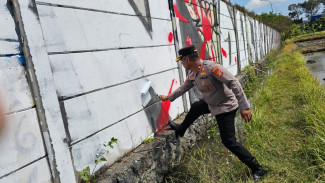 Muncul Tulisan Provokatif, Polsek Denpasar Timur Turun Tangan