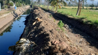 Bantaran Sungai & Sawah Warga Jadi Tempat Pembuangan Sedimen Rehabilitasi DI Bajulmati