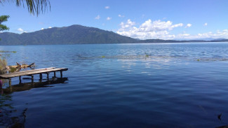 Desa Sukau dan Mitos Naga Emas Danau Ranau