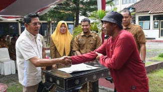 Bantuan Modal UMKM di Lotim Resmi Cair, Bupati Haerul Soroti Peluang dari Program MBG