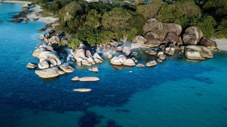 Menyusuri Keindahan Purba dan Kemewahan Bahari di Pantai Tanjung Tinggi Belitung