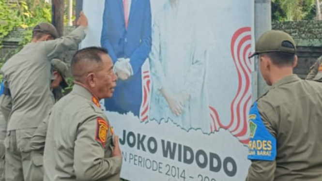 Penertiban Reklame di seputaran Kota di  Kecamatan Negara
