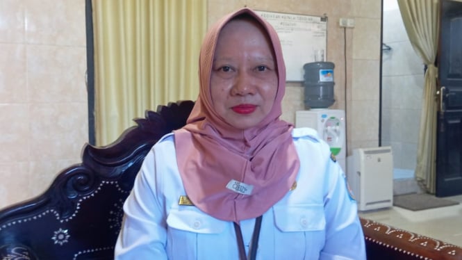 Kepala Sekolah SMPN 15 Mataram Hj. Sri Wahyu Indriani