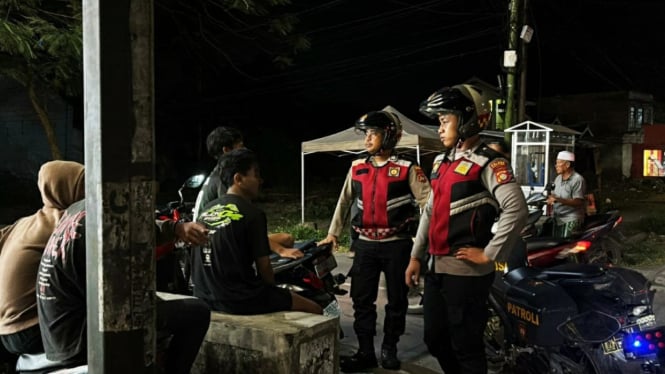 Polisi sedang patroli