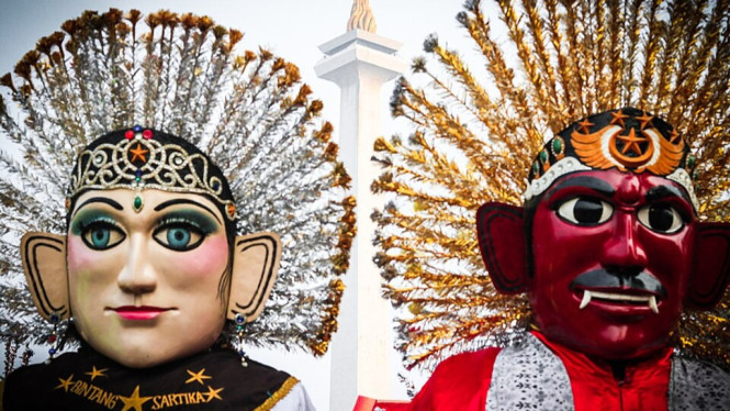 Ilustrasi sepasang Ondel-Ondel, ikon Betawi, Jakarta