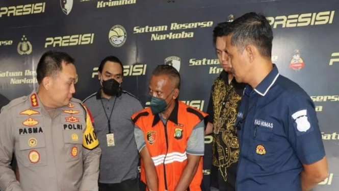 Pelaku penyiraman air keras terhadap anak dan istri