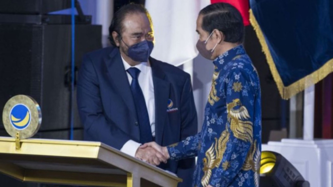 Ketum Nasdem Surya Paloh dan Presiden Jokowi.