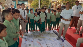 Ratusan Pelajar SD di Tangerang Diajarkan Literasi Keuangan Cegah Kesalahan Saat Bertransaksi