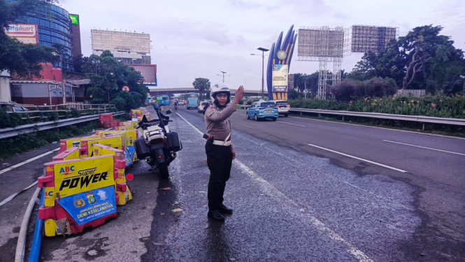 Satlantas Polres bandara soetta saat amankan arus lalu lintas