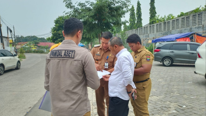 Proses penyelamatan aset oleh JPN Tangerang