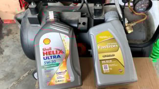 Pertarungan Oli Premium: Shell Helix Ultra vs Pertamina Fastron Gold, Siapa Jawara di Jalanan dan Sirkuit?