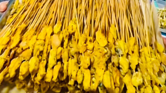 Sate Gurih Belandong Pak Narko: Legendaris di Alun-Alun Purwokerto!