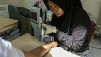 Masyarakat Banyuwangi Nikmati Program Hapus Tato Gratis dari Polisi