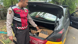 Polisi Amankan 13 Botol Miras Ilegal dari Rumah Seorang Perempuan di Arjasa