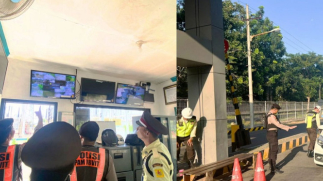 Petugas gabungan memantau situasi melalui CCTV