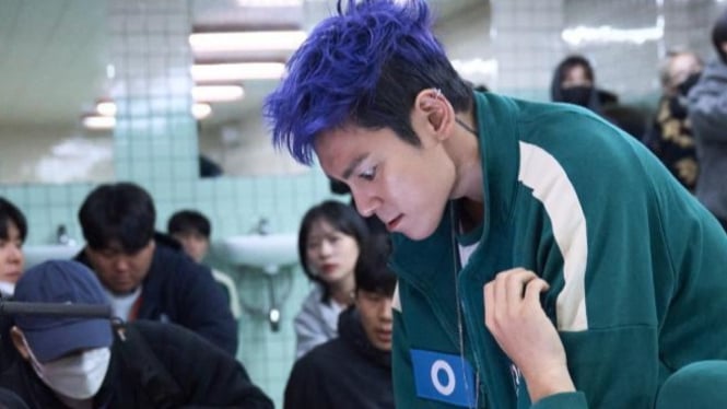 T.O.P berperan sebagai rapper Thanos dalam Squid Game