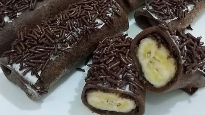 Ilustrasi Dadar Gulung Pisang Coklat Keju yang lezat