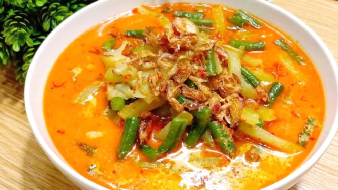 Ilustrasi ketupat sayur yang enak untuk menu lebaranmu