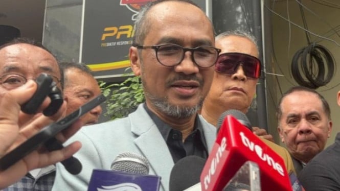 kuasa hukum Jokowi tegaskan: namanya tak ada di laporan.