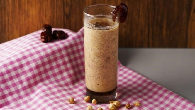 Teh susu minuman hangat manis alami