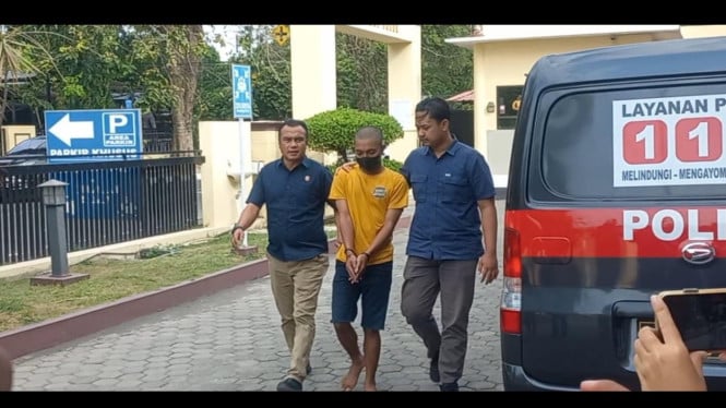 Pelaku AKJ saat digiring Polisi